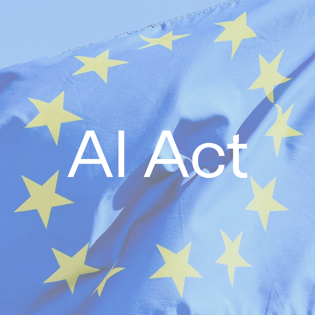 Lähikuva EU:n tähtilipusta ja sen tähdistä, joiden keskellä teksti "AI Act".